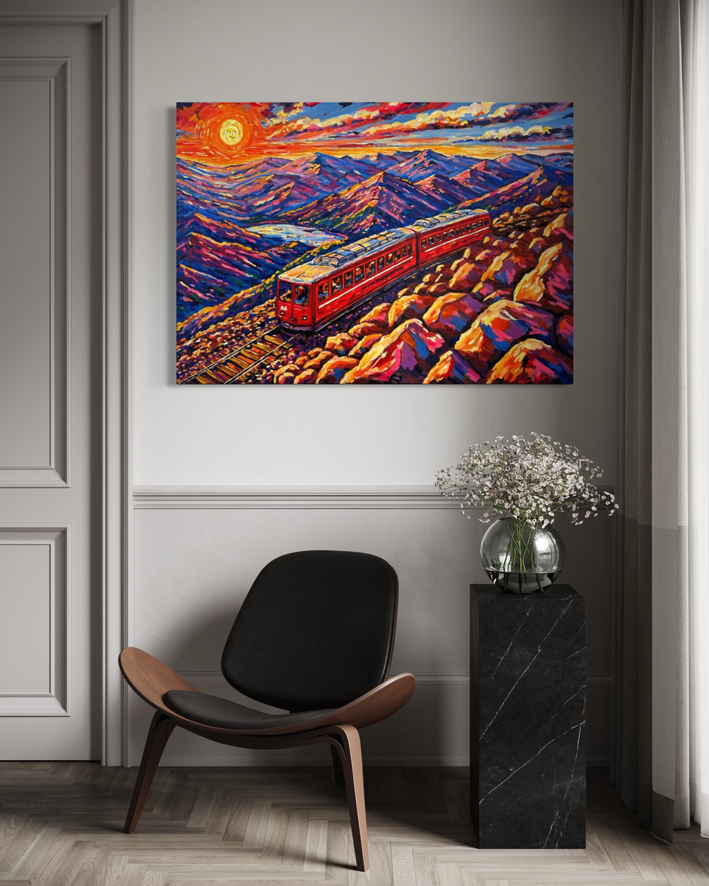 Pikes Peak Cog Railway original oil painting displayed above a chair in a modern interior